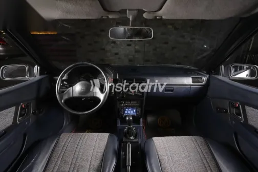 ميتسوبيشي كولت 1990 أبيض مستعملة للبيع - 6