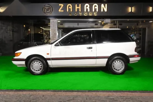 ميتسوبيشي كولت 1990 أبيض مستعملة للبيع - 9