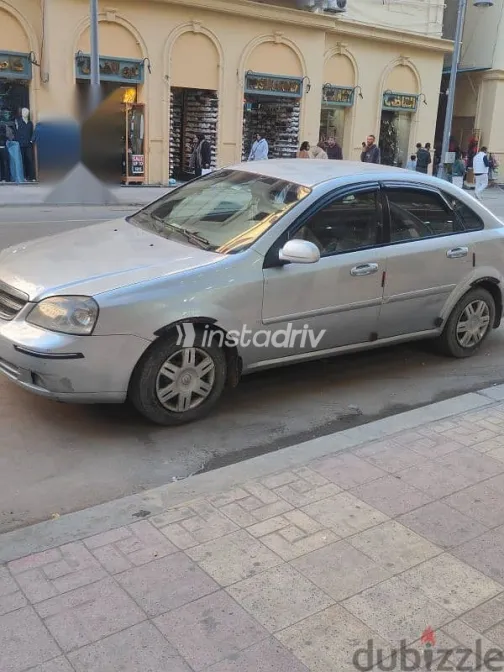 شيفروليه أوبترا 2010 فضي مستعملة للبيع - 2