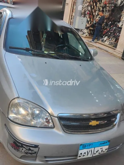 شيفروليه أوبترا 2010 فضي مستعملة للبيع - 4