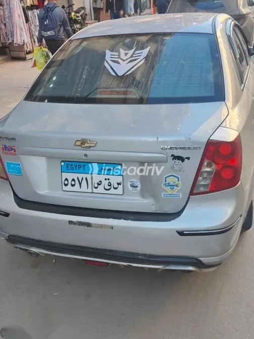 شيفروليه أوبترا 2010 فضي مستعملة للبيع - 5