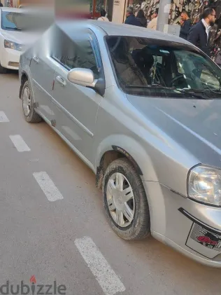 شيفروليه أوبترا 2010 فضي مستعملة للبيع