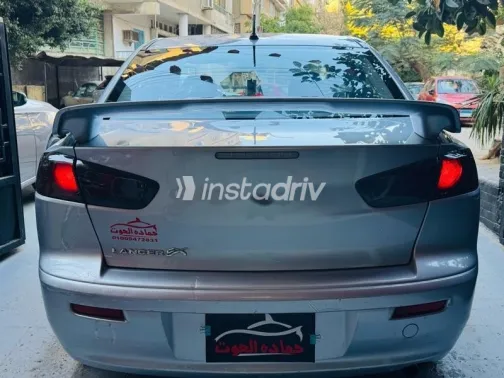 ميتسوبيشي لانسر 2015 فضي مستعملة للبيع - 2