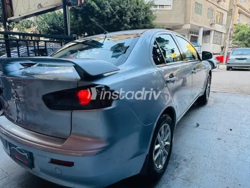 ميتسوبيشي لانسر 2015 فضي مستعملة للبيع - 4