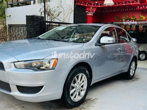 ميتسوبيشي لانسر 2015 فضي مستعملة للبيع - 5