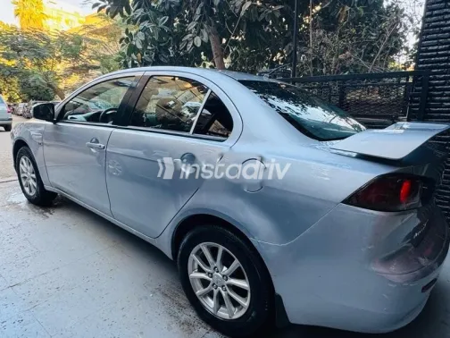 ميتسوبيشي لانسر 2015 فضي مستعملة للبيع - 6