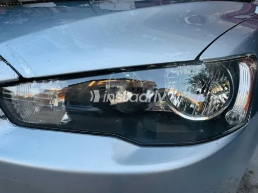 ميتسوبيشي لانسر 2015 فضي مستعملة للبيع - 7