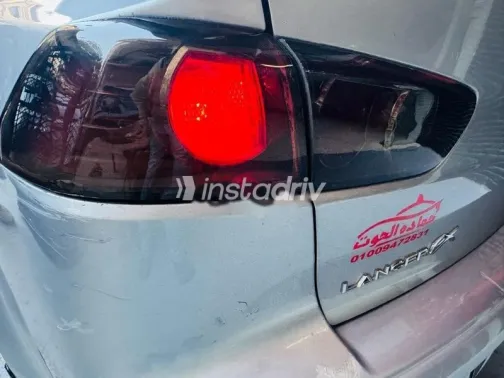 ميتسوبيشي لانسر 2015 فضي مستعملة للبيع - 8