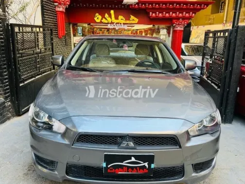 ميتسوبيشي لانسر 2015 رمادي مستعملة للبيع - 1
