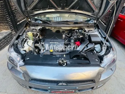 ميتسوبيشي لانسر 2015 رمادي مستعملة للبيع - 8