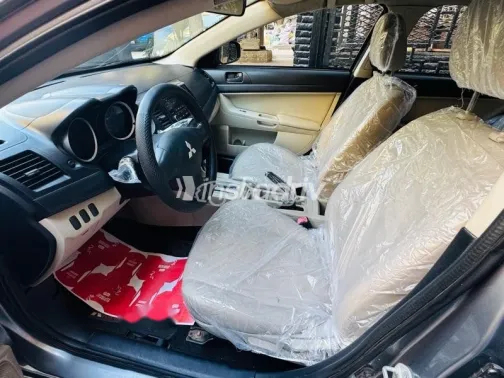 ميتسوبيشي لانسر 2015 رمادي مستعملة للبيع - 9