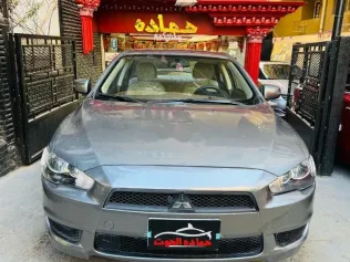ميتسوبيشي لانسر 2015 رمادي مستعملة للبيع