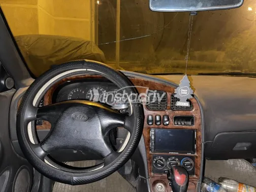 كيا شوما 1998 برونزي مستعملة للبيع - 9