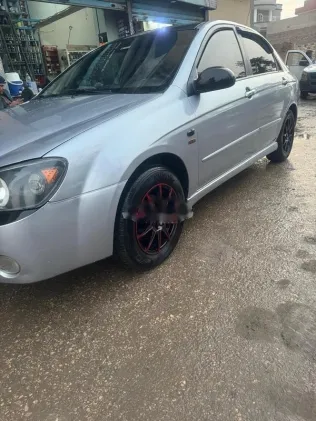 كيا سيراتو 2005 أبيض مستعملة للبيع