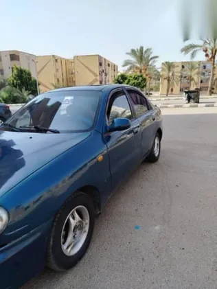 دايو لانوس 1996 أزرق غامق مستعملة للبيع