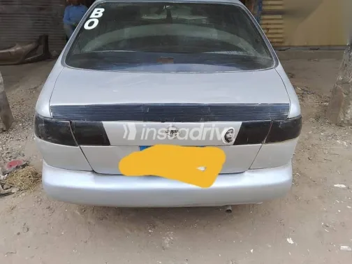 نيسان صنى 1995 رمادي مستعملة للبيع - 1