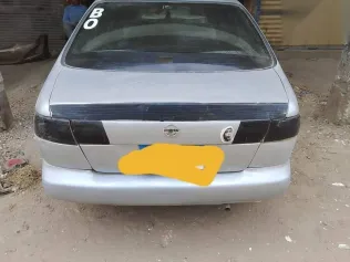 نيسان صنى 1995 رمادي مستعملة للبيع