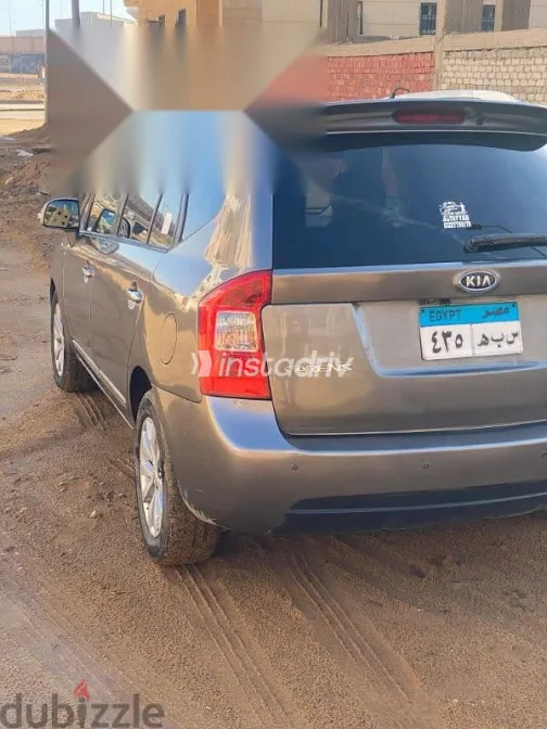 كيا كارينز 2012 فضي مستعملة للبيع - 2