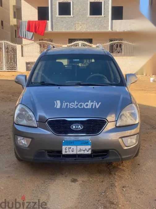 كيا كارينز 2012 فضي مستعملة للبيع - 7