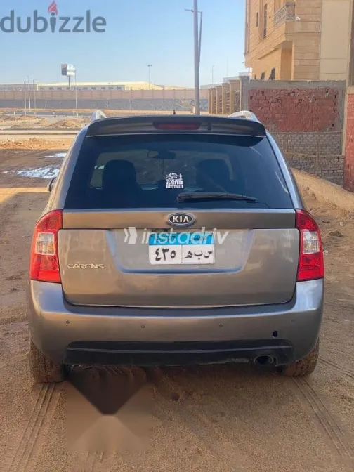 كيا كارينز 2012 فضي مستعملة للبيع - 8