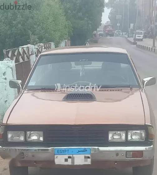 ميتسوبيشي جالانت 1980 بني مستعملة للبيع - 1