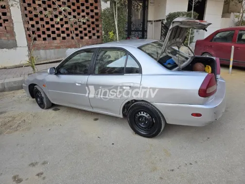 ميتسوبيشي لانسر 1999 فضي مستعملة للبيع - 2