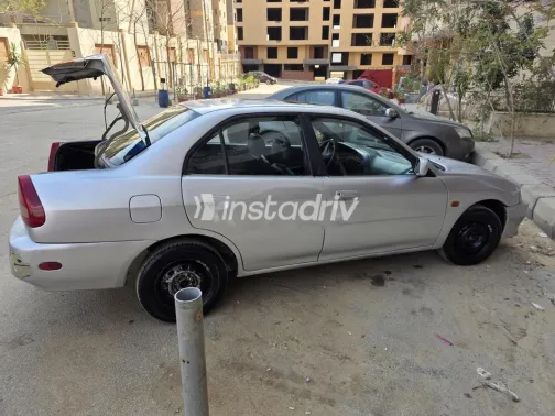 ميتسوبيشي لانسر 1999 فضي مستعملة للبيع - 3