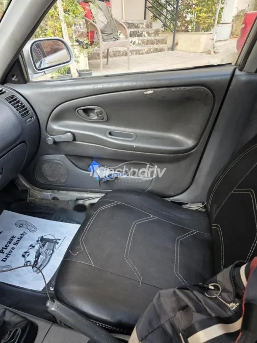 ميتسوبيشي لانسر 1999 فضي مستعملة للبيع - 7