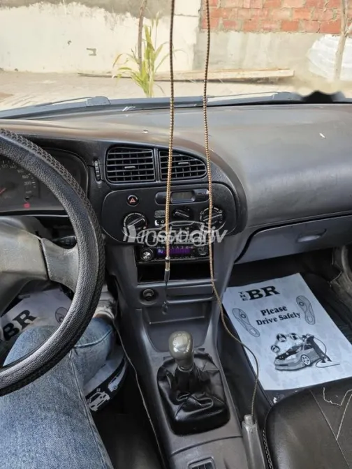 ميتسوبيشي لانسر 1999 فضي مستعملة للبيع - 8