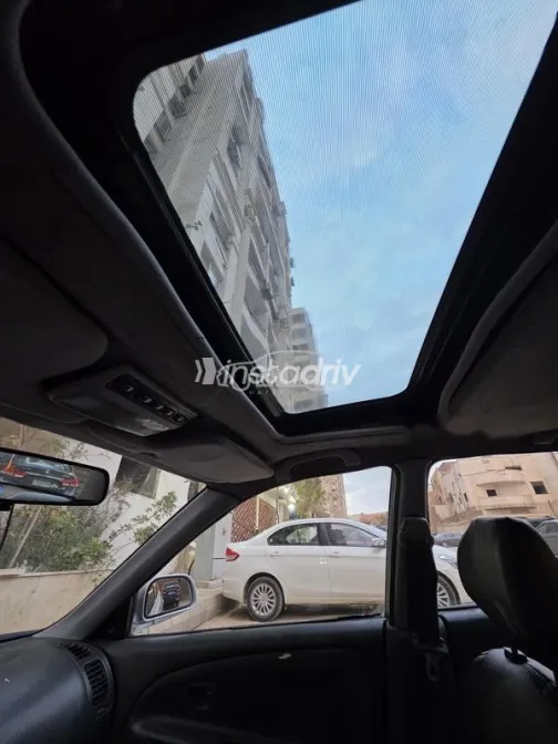 ميتسوبيشي لانسر 1999 فضي مستعملة للبيع - 10