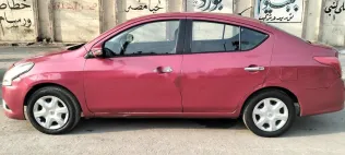 نيسان صنى 2016 أحمر مستعملة للبيع