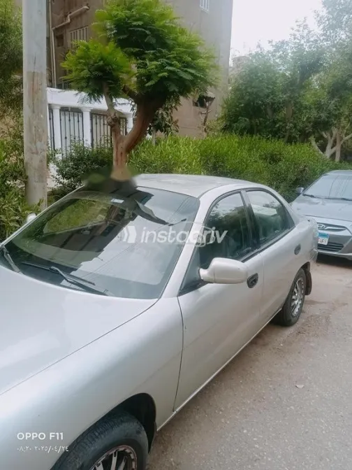 كيا برايد 2001 أبيض مستعملة للبيع - 2