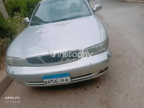 كيا برايد 2001 أبيض مستعملة للبيع - 3