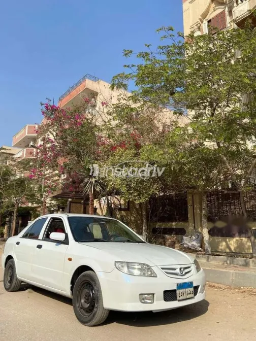 كيا برايد 2001 أبيض مستعملة للبيع - 7