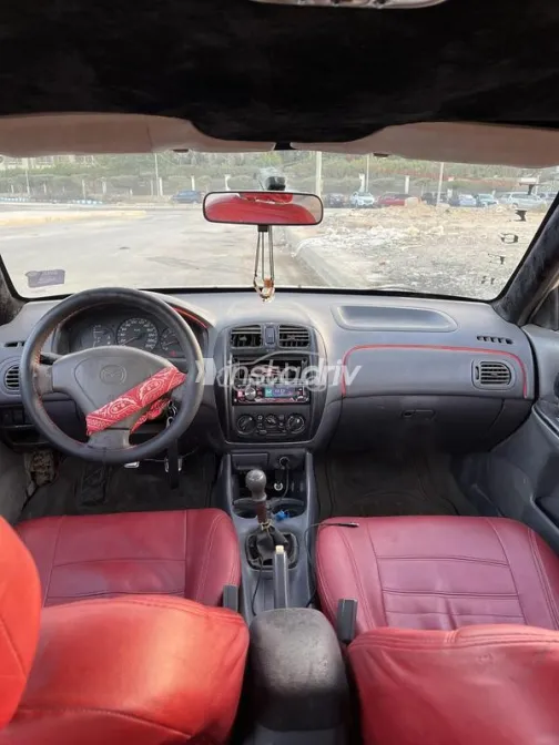 كيا برايد 2001 أبيض مستعملة للبيع - 9