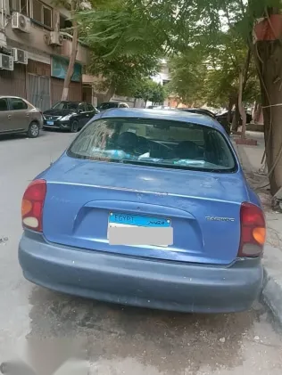 دايو لانوس 2005 أزرق غامق مستعملة للبيع