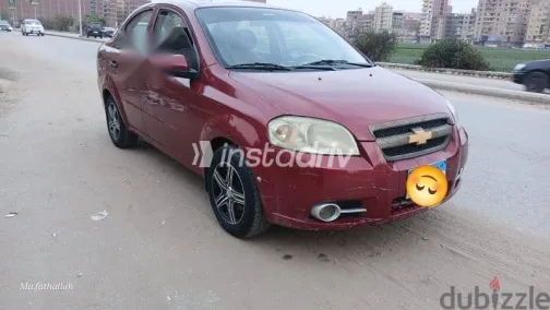 شيفروليه افيو 2010 أحمر مستعملة للبيع - 1
