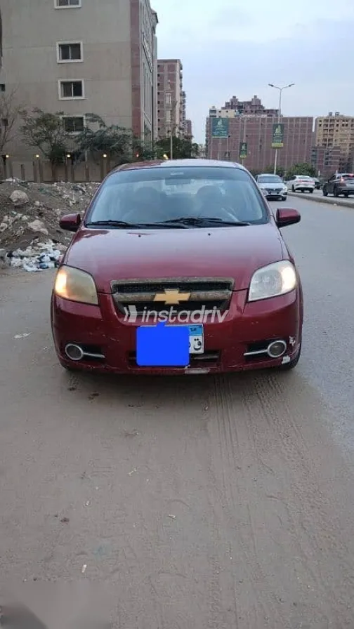 شيفروليه افيو 2010 أحمر مستعملة للبيع - 2