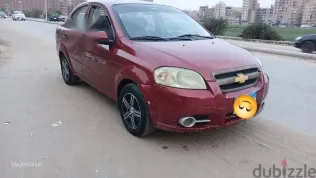 شيفروليه افيو 2010 أحمر مستعملة للبيع