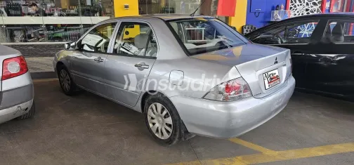 ميتسوبيشي لانسر 2014 فضي مستعملة للبيع - 2