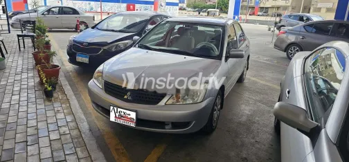 ميتسوبيشي لانسر 2014 فضي مستعملة للبيع - 3