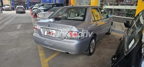 ميتسوبيشي لانسر 2014 فضي مستعملة للبيع - 4