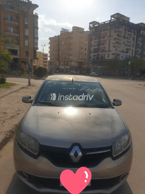 رينو لوجان 2015 أبيض مستعملة للبيع - 2