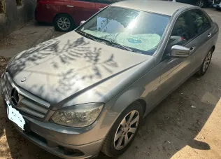 مرسيدس C 180 2009 أبيض مستعملة للبيع