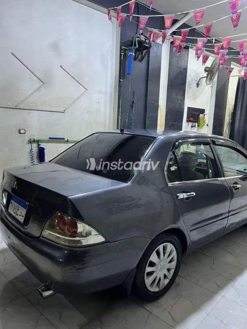 ميتسوبيشي لانسر بومة 2009 رمادي مستعملة للبيع - 3