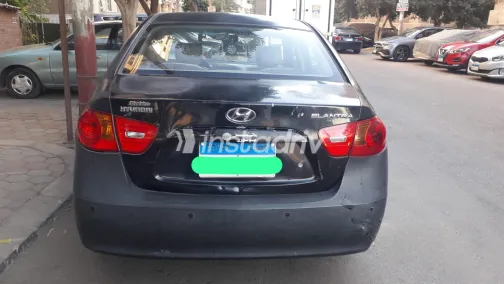 هيونداي إلنترا 2007 أبيض مستعملة للبيع - 1