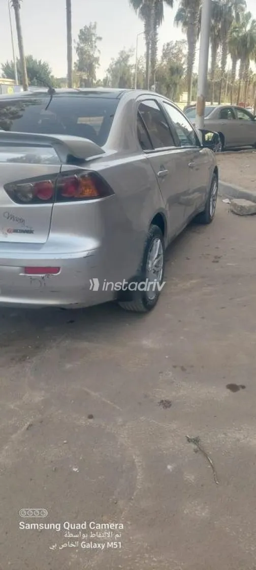 ميتسوبيشي لانسر اى اكس شارك 2016 فضي مستعملة للبيع - 3