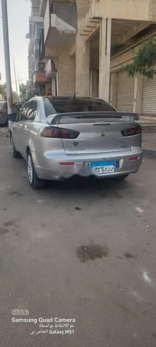 ميتسوبيشي لانسر اى اكس شارك 2016 فضي مستعملة للبيع