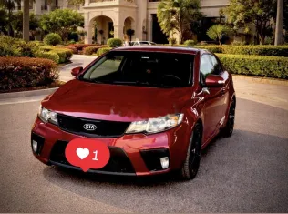 كيا سيراتو كوبيه 2011 أحمر غامق مستعملة للبيع