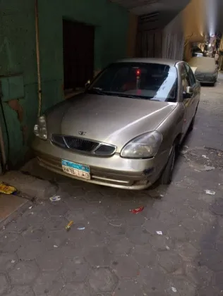 دايو نوبيرا 1999 ذهبي مستعملة للبيع